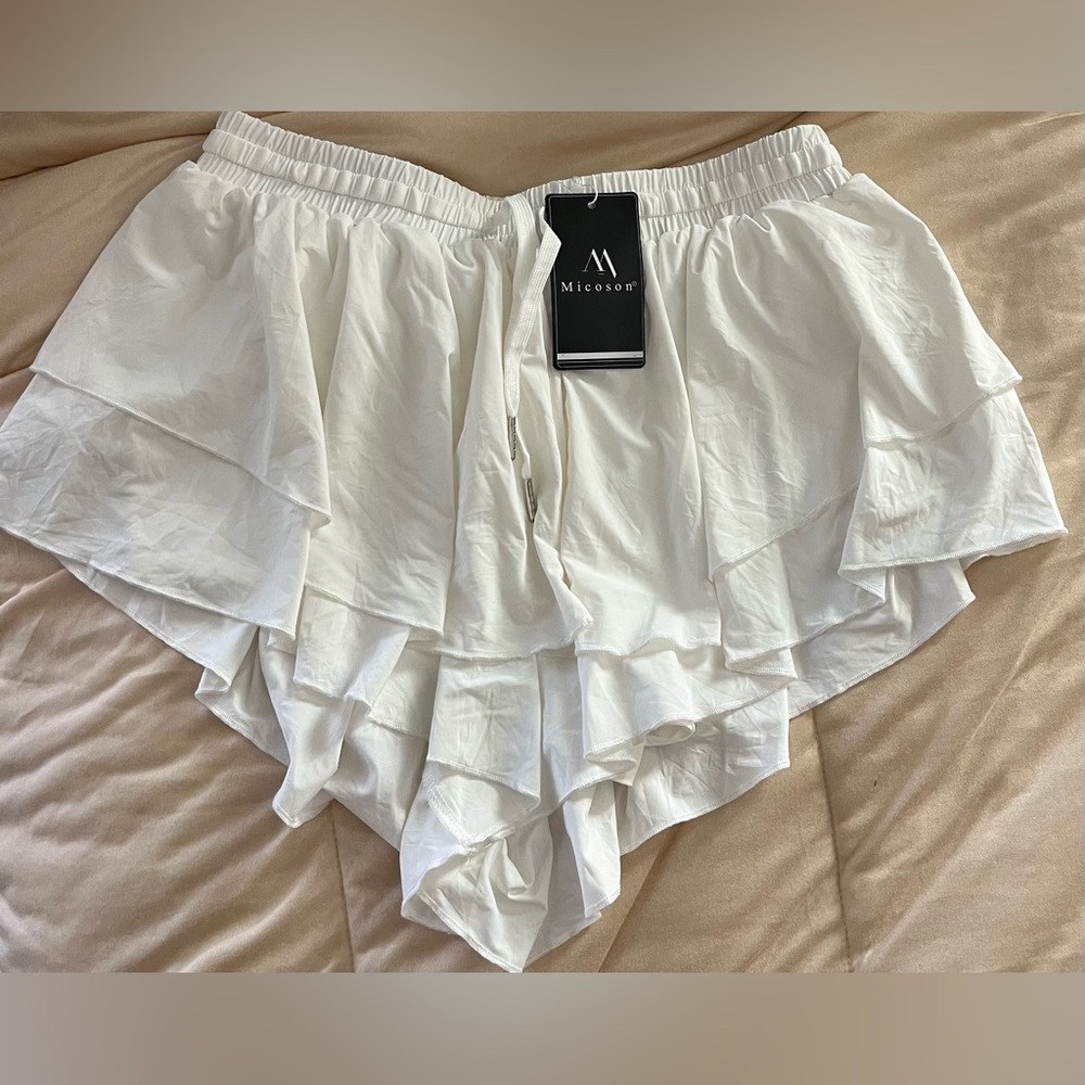 Micoson white ruffled swimsuit bottoms size large . New with tags
